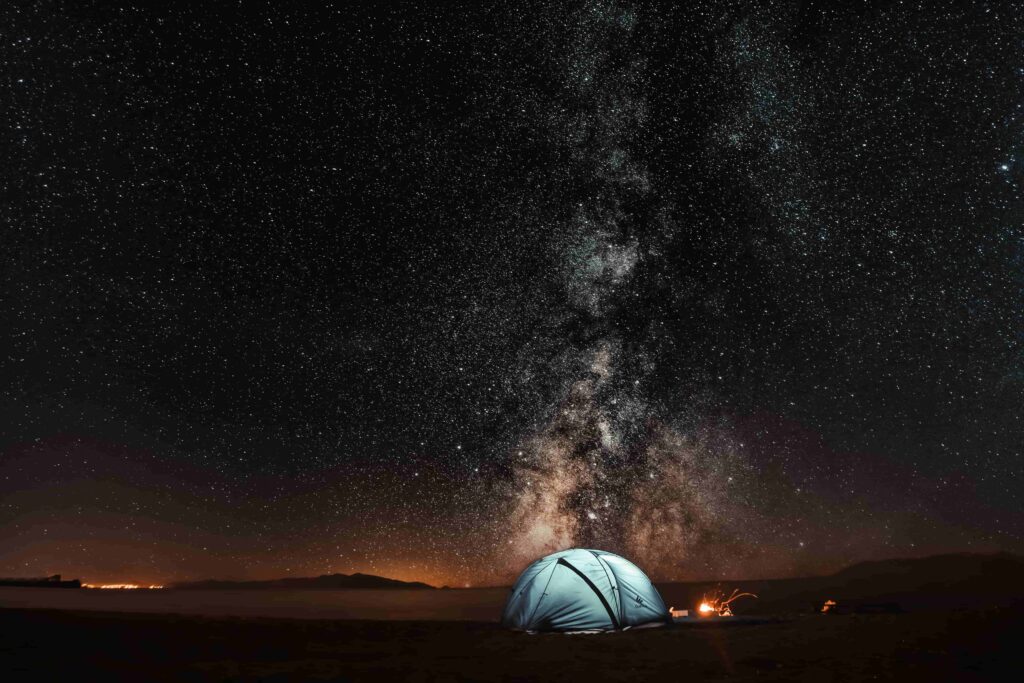 Tent in a desert, on a budget trip 